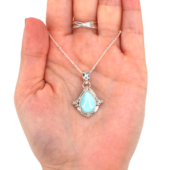 Larimar Trinity Beaded Necklace on model for color reference.
Larimar Trinity Beaded Necklace on model for color reference.