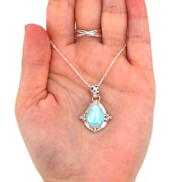 Larimar Ocean Tide Trinity Beaded Necklace on model for color reference. 

