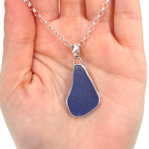 Cornflower Medium Drop Sea Glass Bezel Necklace on model for color reference.