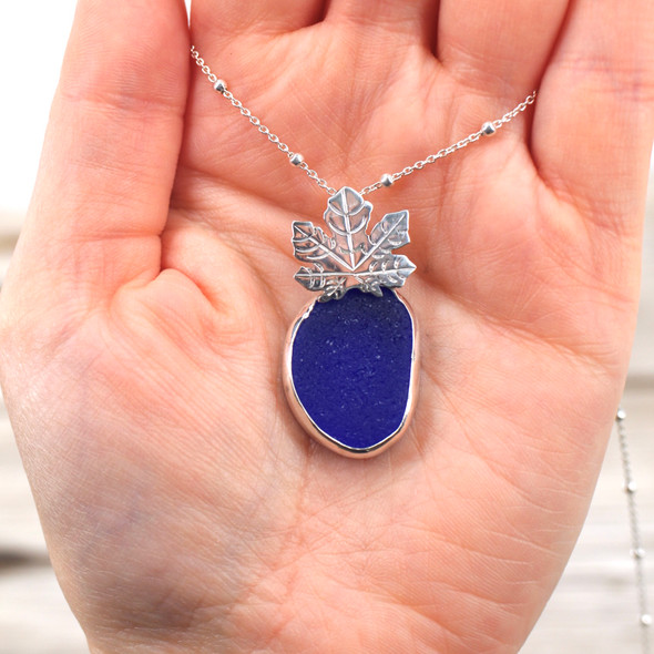 Insta Sale Cobalt Sea Glass Maple Leaf Necklace - MM on model for color reference. 