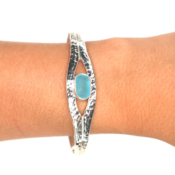 Light Turquoise Sea Glass Hammered Cuff Bracelet on model for color reference. 