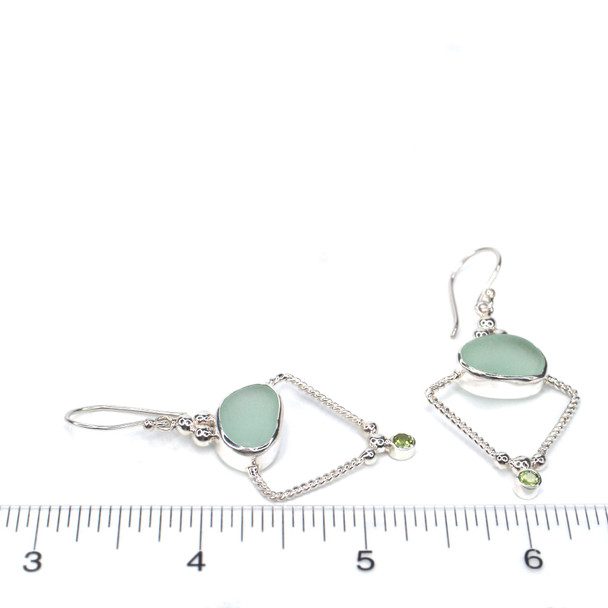 Seafoam Sea Glass and Peridot Trinity Halo Earrings on ruler for size reference.