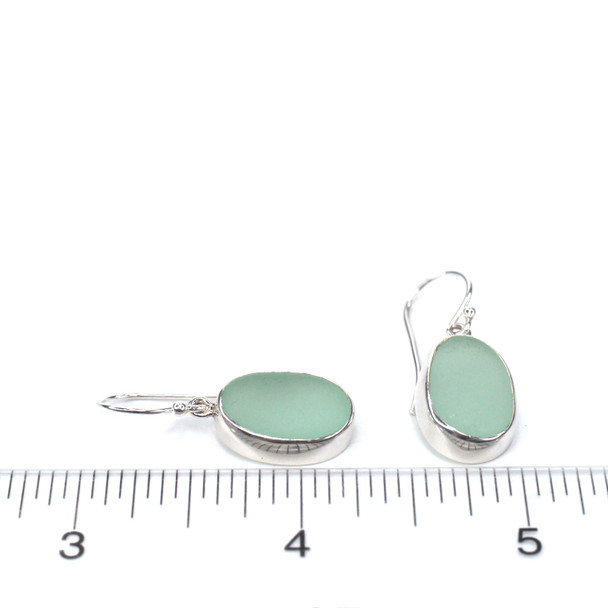 Seafoam Oval Sea Glass Single Bezel Earrings on ruler for size reference.