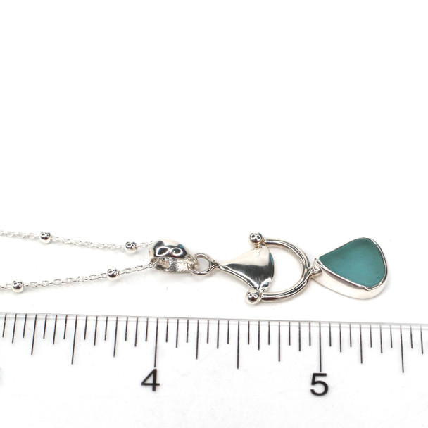 Aqua Sea Glass Bit Necklace on ruler for size reference.