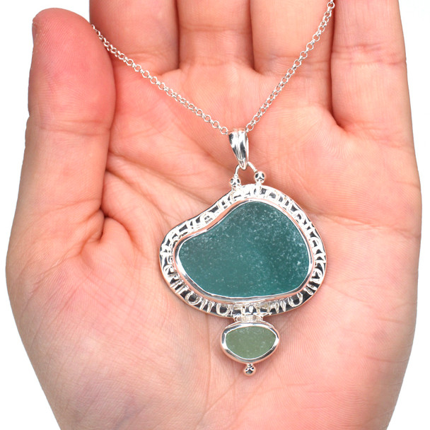 Aqua Allure and Seafoam Sea Glass Enchanted Cove Double Necklace on model for color reference.