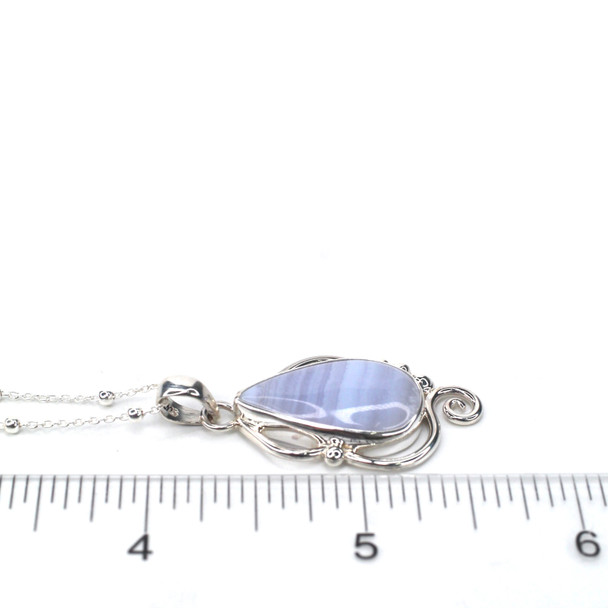 Lace Agate Mystic Current Necklace on ruler for size reference.