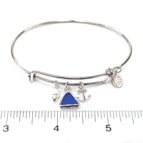 Cornflower Triangle Sea Glass Adjustable Anchor Charm Bangle Bracelet on ruler for size reference.