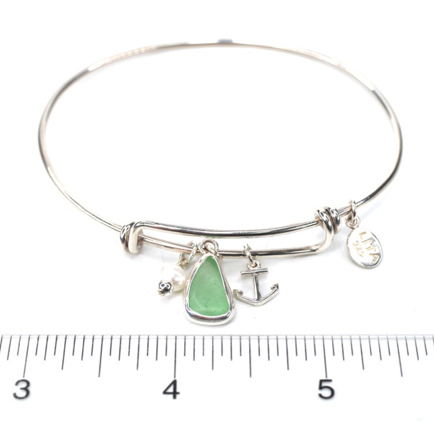 Seafoam Bright Sea Glass Adjustable Anchor Charm Bangle Bracelet on ruler for size reference.