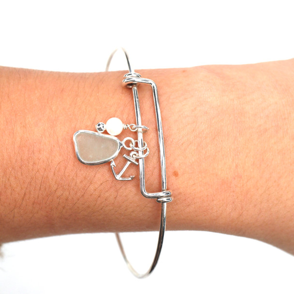 Seafoam Sea Glass Adjustable Anchor Charm Bangle Bracelet on model for color reference.