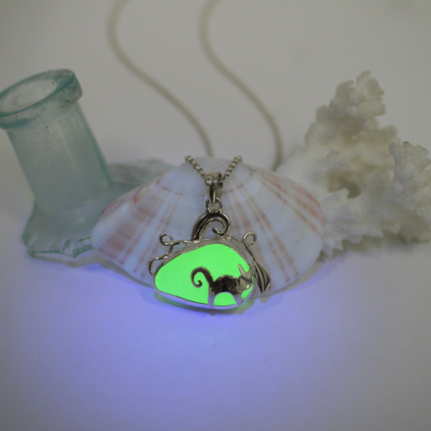 Seafoam UV Glass Cat and Pumpkin Necklace under a black light