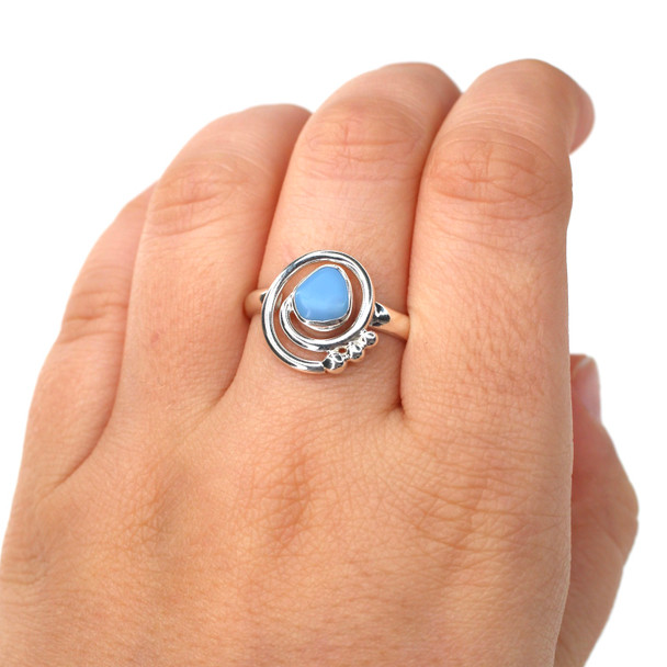 Cornflower Milk Glass Petite Swirl Ring - Size 9 on model for color reference.