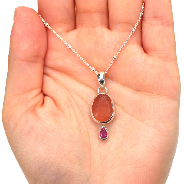 Pink Sea Glass and Ruby Double Necklace on model for color reference.