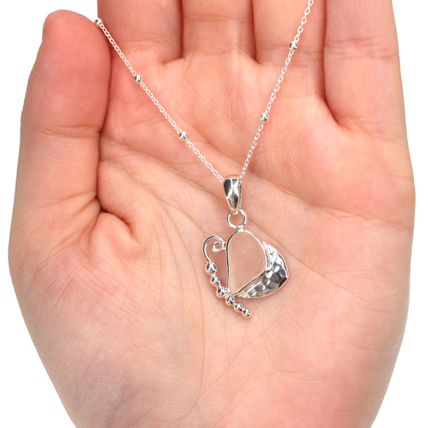 Pink Sea Glass Mariposa Necklace on model for color reference.