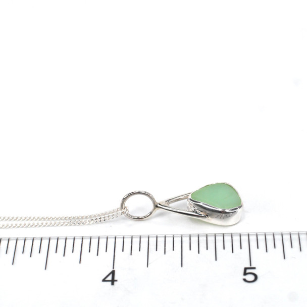 Seafoam Milk Glass Lunar Drop Charm on ruler for size reference. 