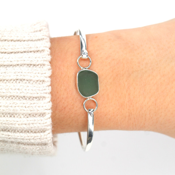 Olive Smooth Sea Glass Bezel Bangle Bracelet on model for color reference.