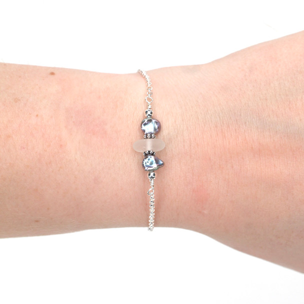 White Sea Glass and Dainty Peacock Pearl Bracelet on model for color reference.