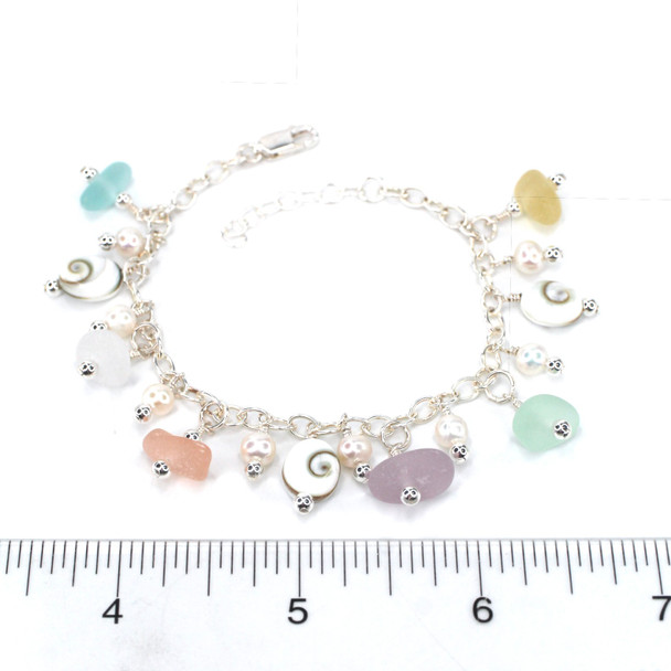 Pastel Bright Sea Glass and Shiva Shell Charm Bracelet on ruler for size reference.
