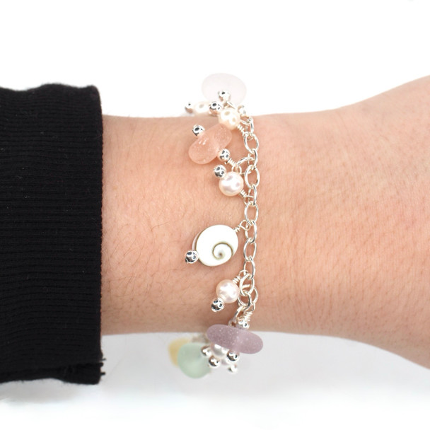 Pastel Bright Sea Glass and Shiva Shell Charm Bracelet on model for color reference.