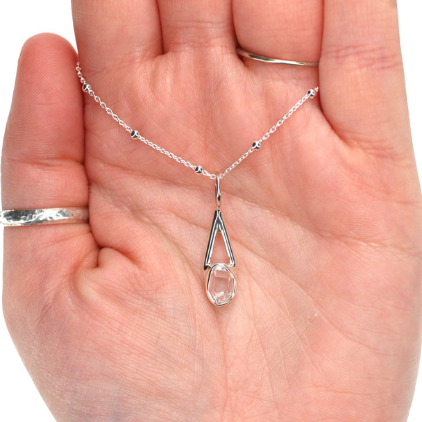 Herkimer Diamond Lunar Drop Charm #4 on model for color reference.