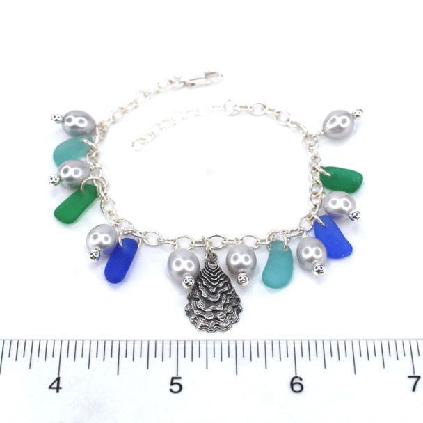 Tropical Sea Glass and Gray Pearl Oyster Charm Bracelet on ruler for size reference.