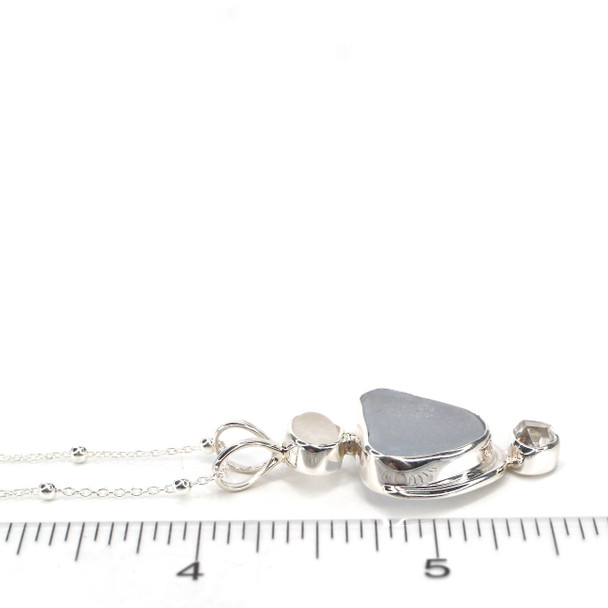 Ice Blue Sea Glass and Herkimer Diamond Eclipse Necklace on ruler for size reference.