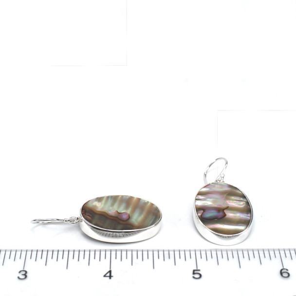 Abalone Single Bezel Earrings on ruler for size reference.