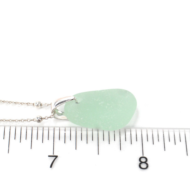 Seafoam Smooth Sea Glass Pinch Necklace on ruler for size reference. 