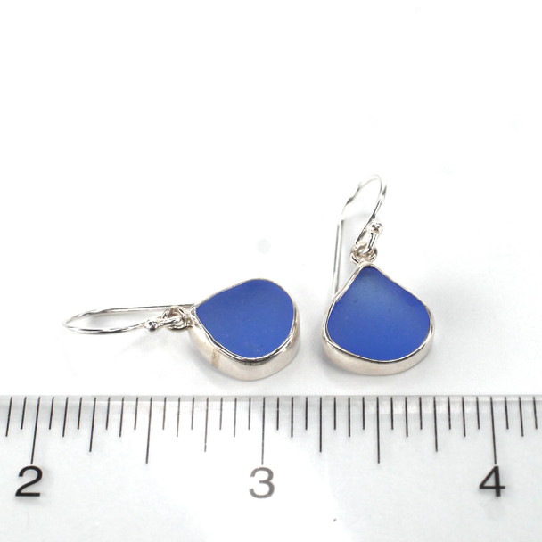 Cornflower Sea Glass Bezel Earrings on ruler for size reference. 