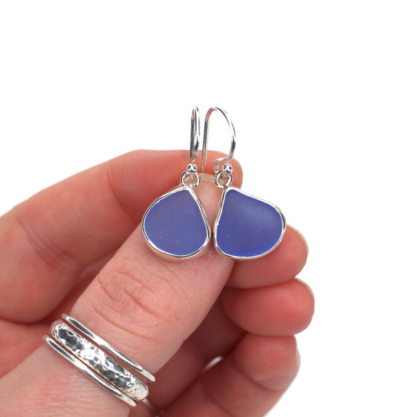 Cornflower Sea Glass Bezel Earrings on model for color reference. 