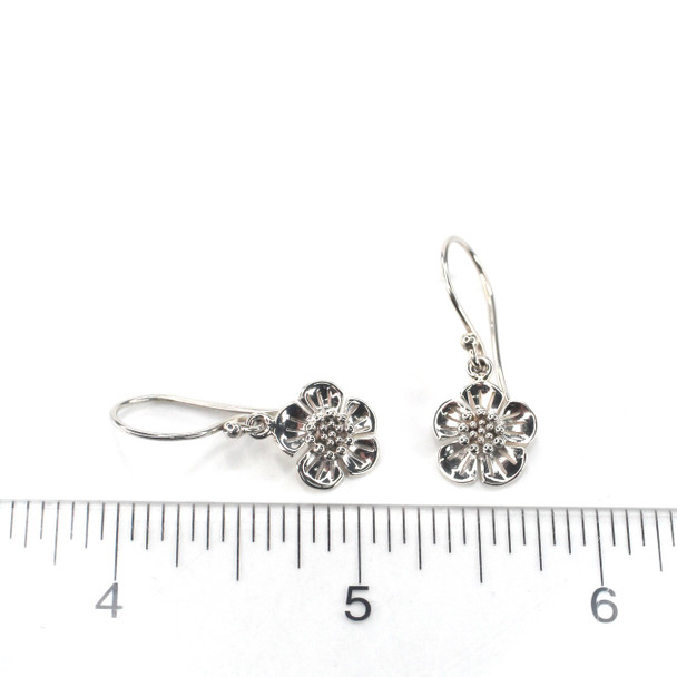 Buttercup Flower Sterling Silver Earrings on ruler for size reference.