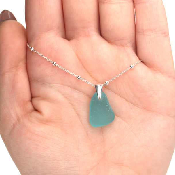 Aqua Allure Sea Glass Pinch Necklace on model for color reference. 