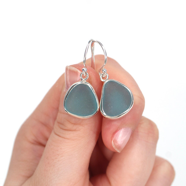 Aqua Gumdrop Sea Glass Single Bezel Earrings on model for color reference.