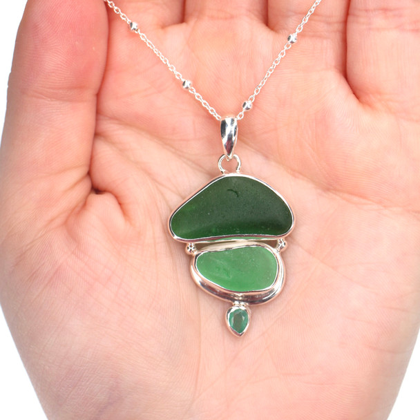 Green Sea Glass and Emerald Three Tier Necklace on model for color reference.