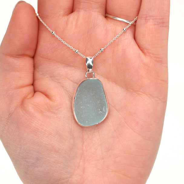 Aqua Ice Sea Glass Bezel Set Necklace on model for color reference. 