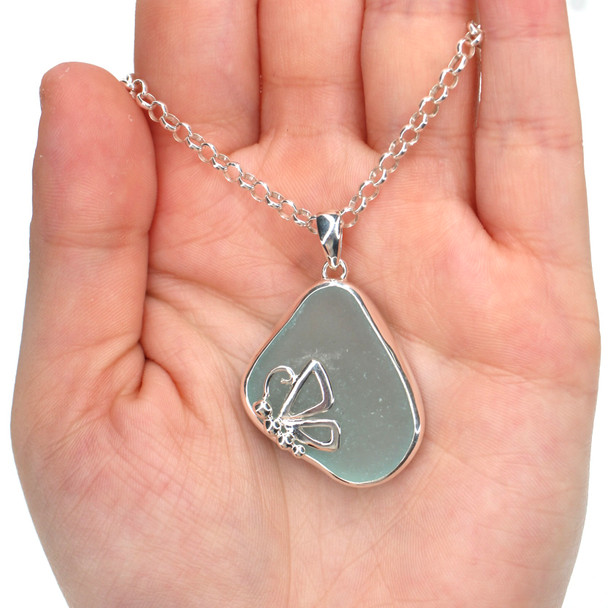 Seafoam Sweet Sea Glass Poised Butterfly Necklace on model for color reference.