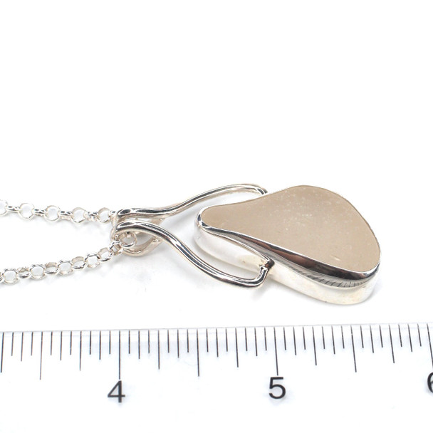 White Sea Glass Pharaoh Necklace on ruler for size reference. 