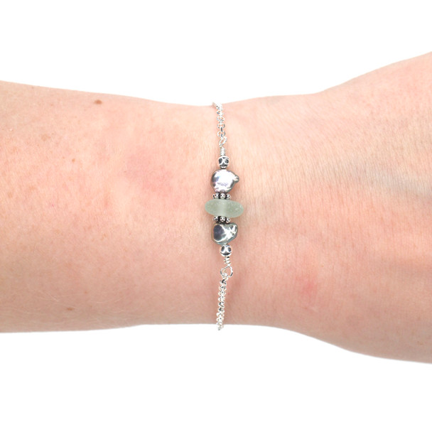 Seafoam Sea Glass and Dainty Peacock Pearl Bracelet on model for color reference.