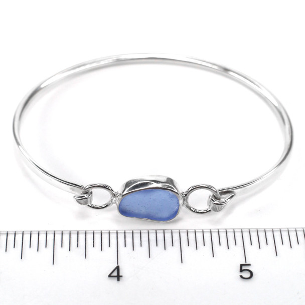 Cornflower Sea Glass Hinge Bangle Bracelet on ruler for size reference. 