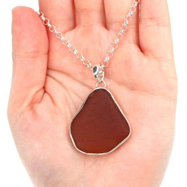 Amber Cinnamon Bold Sea Glass Single Bezel Necklace on model for color reference.