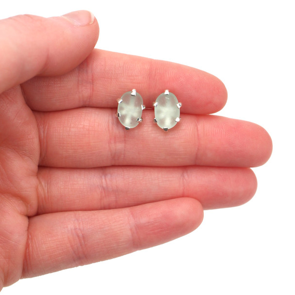 Seafoam Sea Glass Prong Post Earrings on model for color reference. 