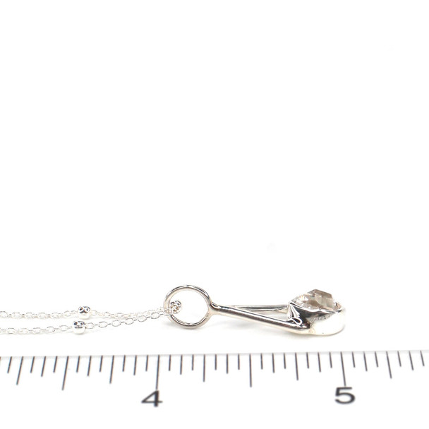 Herkimer Diamond Lunar Drop Charm on ruler for size reference.