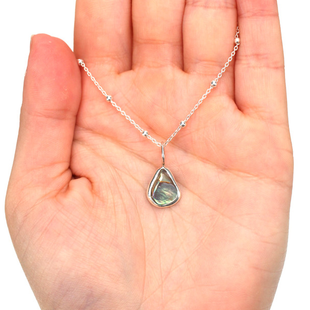 Abalone Teardrop Charm on model for color reference.