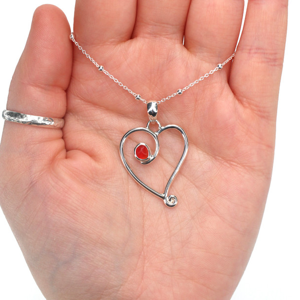 Red Bright Spot Sea Glass Ocean Love Necklace on model for color reference.