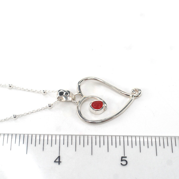 Red Bright Spot Sea Glass Ocean Love Necklace on ruler for size reference.