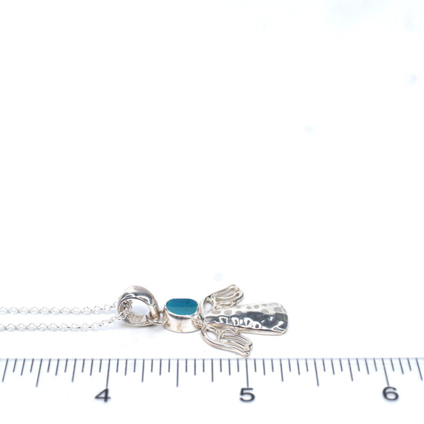 Turquoise Bright Spot Ultra Rare Sea Glass Ocean Angel Necklace on ruler for size reference.