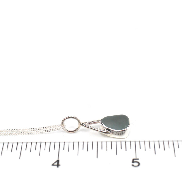Gray Sea Glass Lunar Drop Charm on ruler for size reference. 