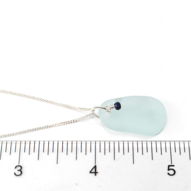 White Icicle Sea Glass and Lapis Gemstone Drop Necklace on ruler for size reference.