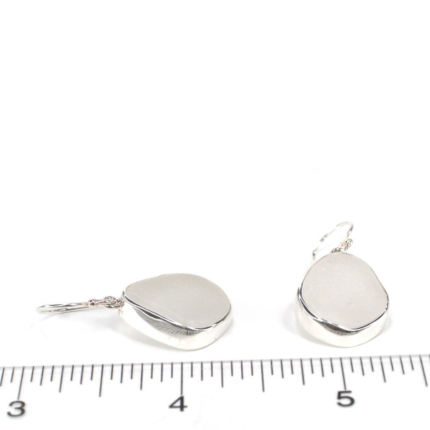White Snow Sea Glass Bezel Earrings on ruler for size reference.