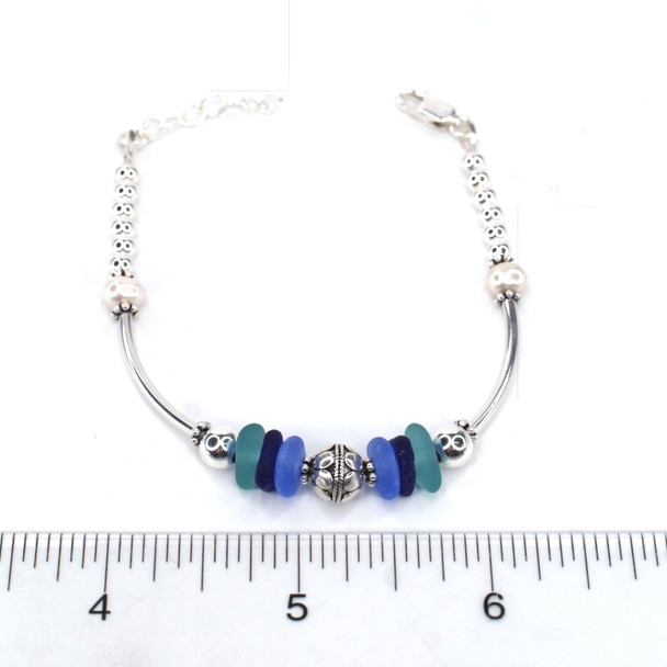 Beautiful Blues Sea Glass and Pearl Daisy Bracelet on ruler for size reference.