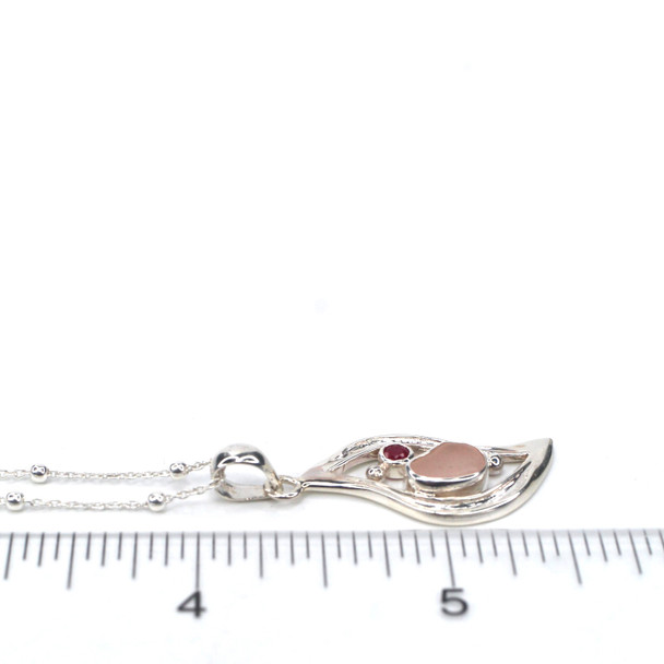 Pink Sea Glass and Ruby Wavy Necklace on ruler for size reference.